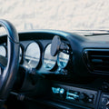 Rinashi classic 911 gauge mount phone holder installed on dashboard